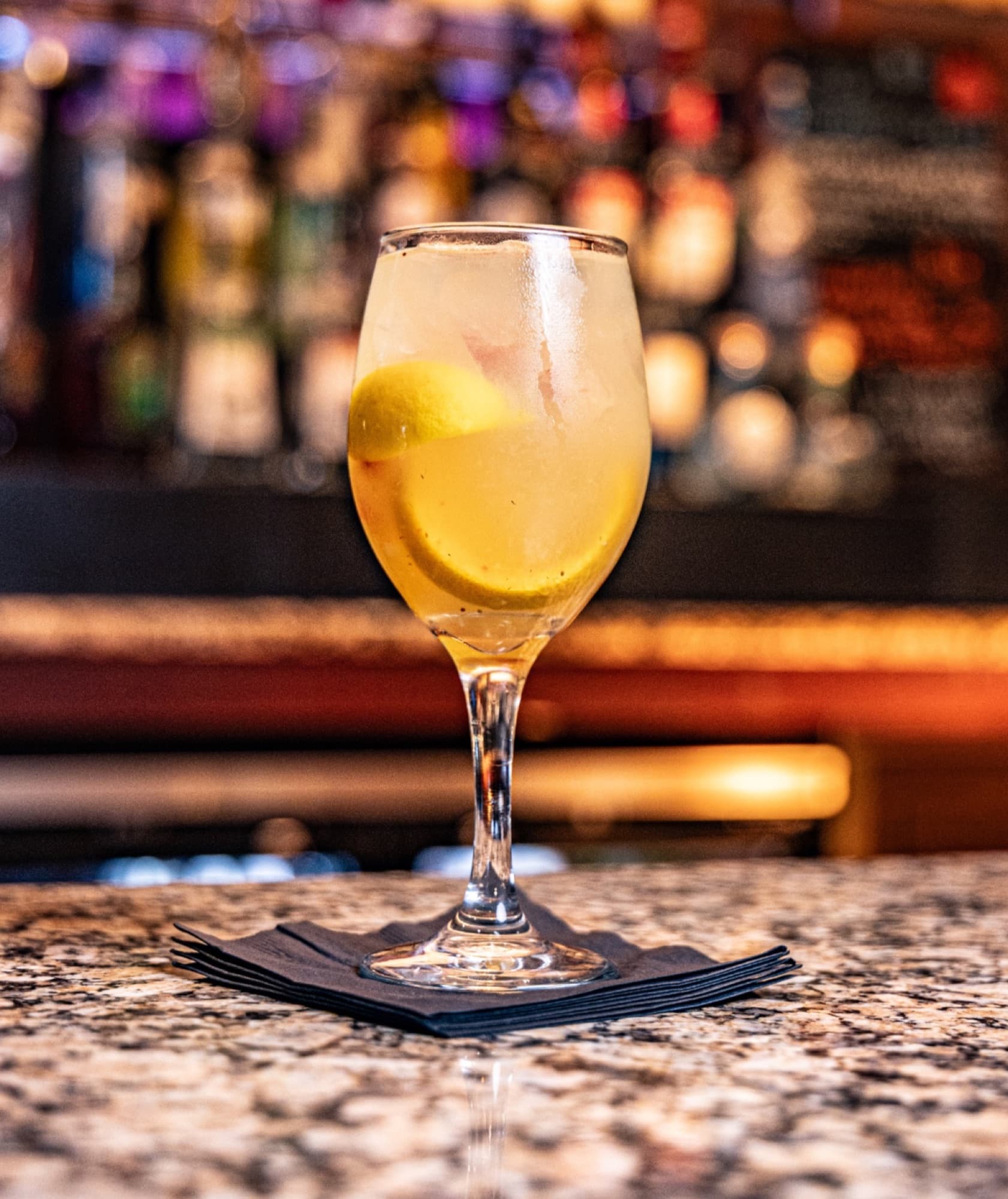 A glass of wine at the bar