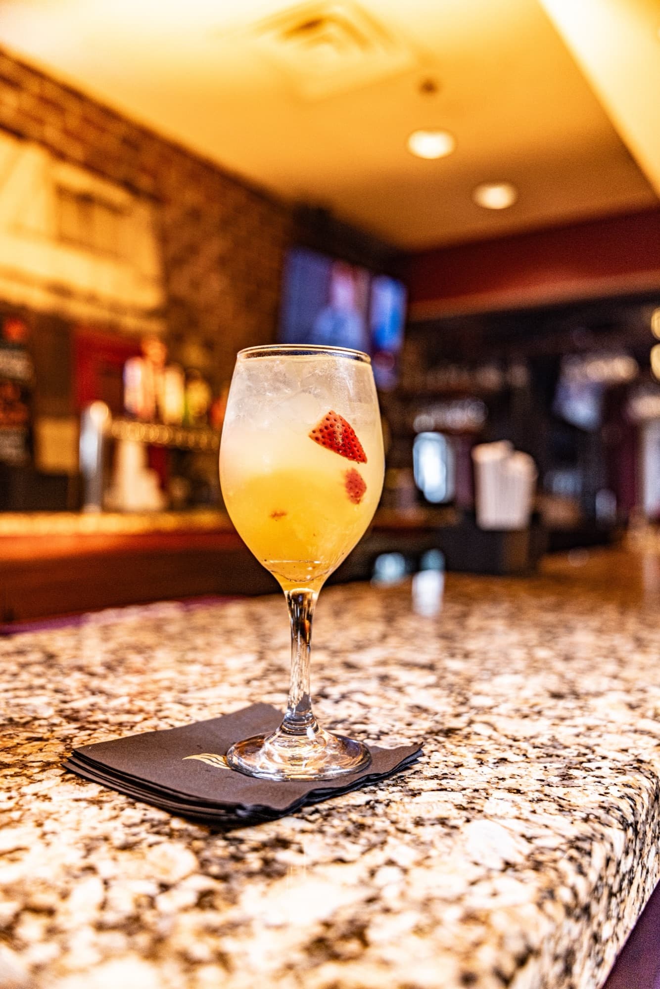 Signature cocktail on the granite bar top