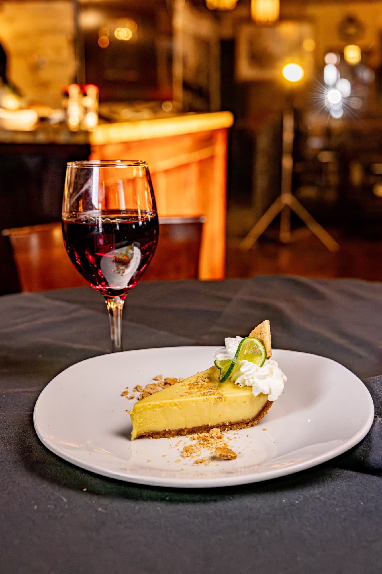 Slice of key lime pie with whipped cream
