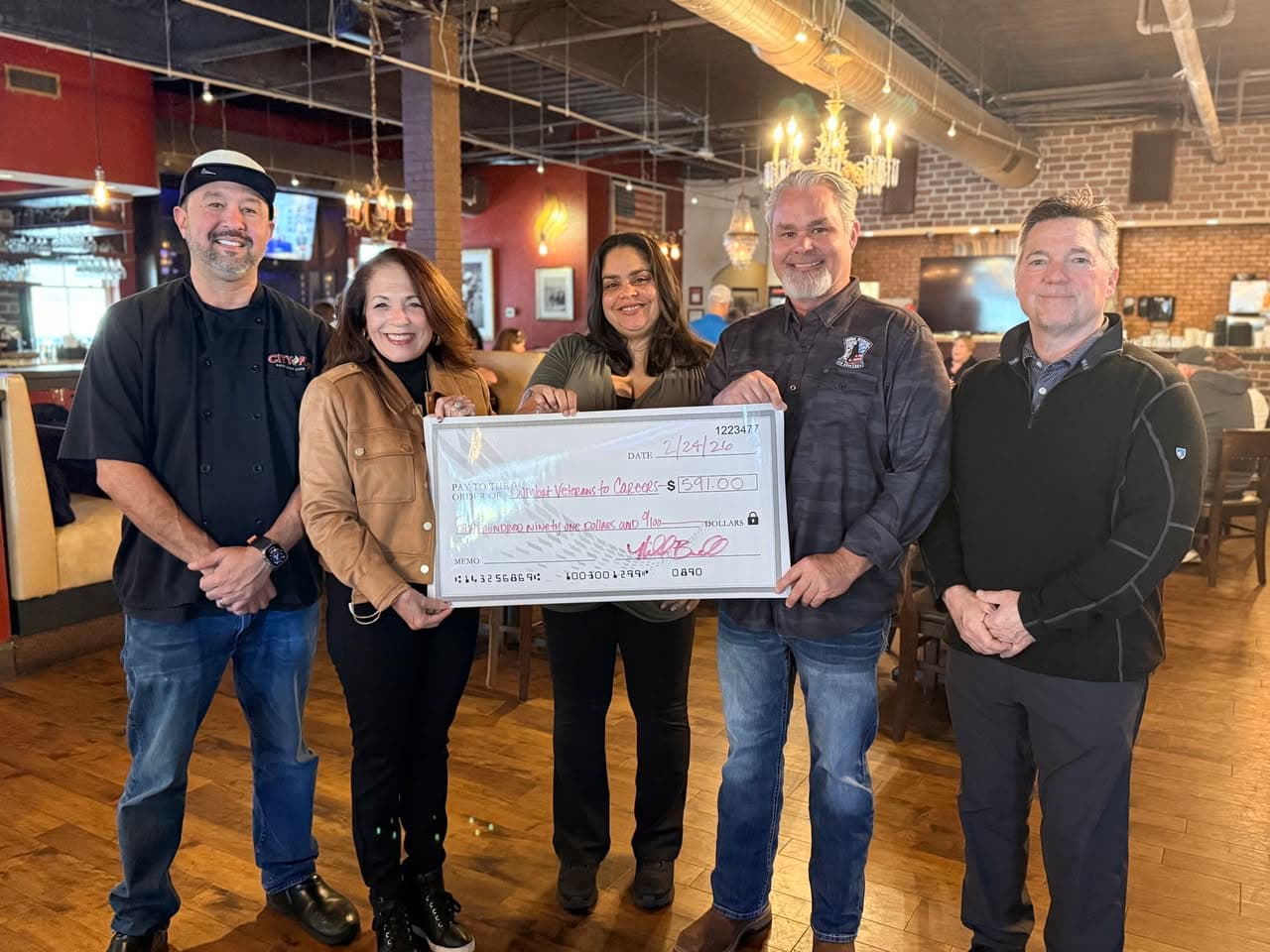 City Fire presenting a donation to Combat Veterans to Careers